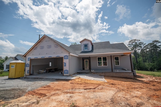 281 Osprey Pointe Ln, Prosperity, SC 29127 - view of front of property featuring a garage, covered porch, and gravel driveway