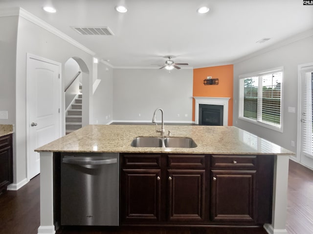 kitchen with dishwasher, a sink, a ceiling fan, dark wood-style flooring, and ornamental molding