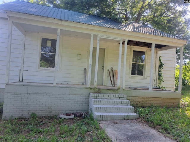 29 Seaboard St, Great Falls, SC 29055 - view of front of property with covered porch and metal roof