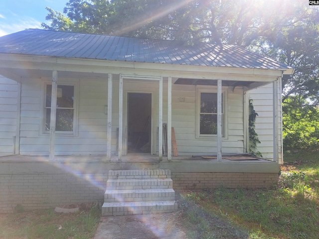 29 Seaboard St, Great Falls, SC 29055 - view of front of property featuring a porch and metal roof