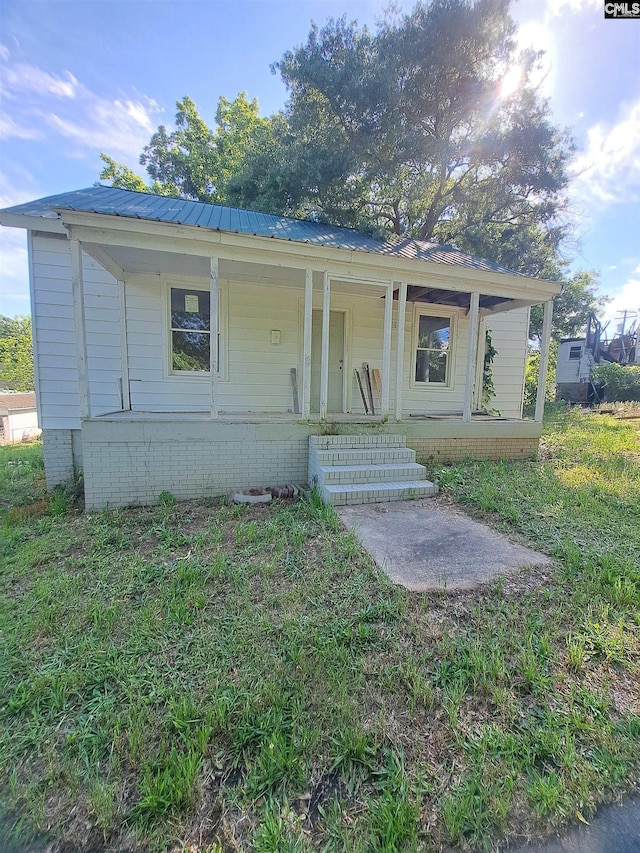 29 Seaboard St, Great Falls, SC 29055 - bungalow with covered porch and metal roof