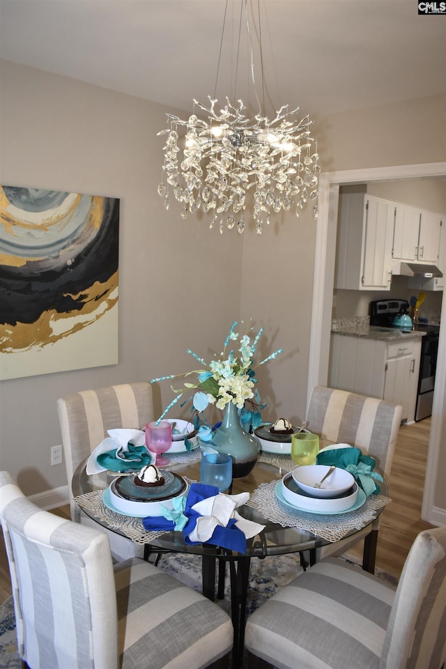 813 Greenlawn Dr, Columbia, SC 29209 - dining room with a chandelier and light wood-type flooring