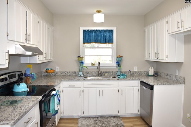 813 Greenlawn Dr, Columbia, SC 29209 - kitchen with stainless steel appliances, under cabinet range hood, a sink, and white cabinets