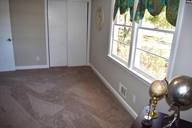 813 Greenlawn Dr, Columbia, SC 29209 - unfurnished bedroom featuring carpet floors, a closet, and baseboards