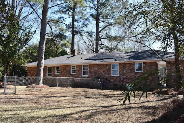 813 Greenlawn Dr, Columbia, SC 29209 - rear view of house featuring fence, a chimney, brick siding, and crawl space