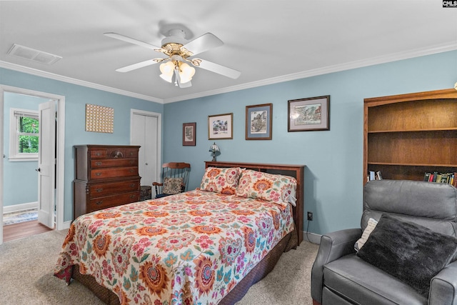 4833 Circle Dr, Columbia, SC 29206 - carpeted bedroom featuring crown molding, baseboards, ceiling fan, and a closet
