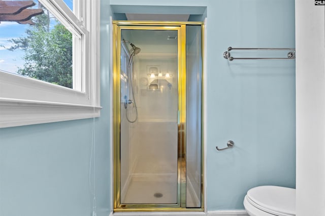 4833 Circle Dr, Columbia, SC 29206 - bathroom with a shower stall, toilet, and healthy amount of natural light