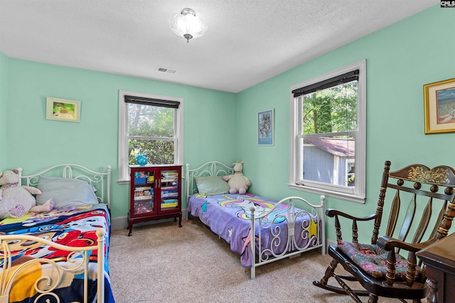 4833 Circle Dr, Columbia, SC 29206 - bedroom with carpet and a textured ceiling