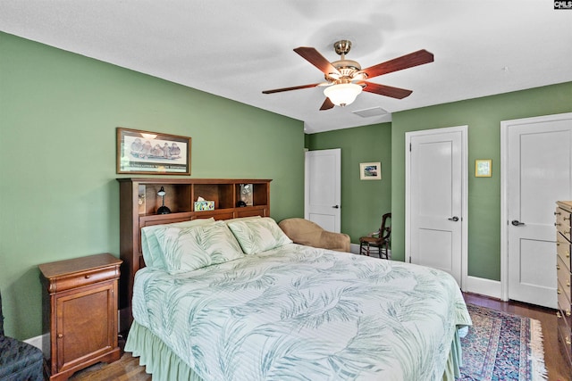 4833 Circle Dr, Columbia, SC 29206 - bedroom with wood finished floors, baseboards, and a ceiling fan