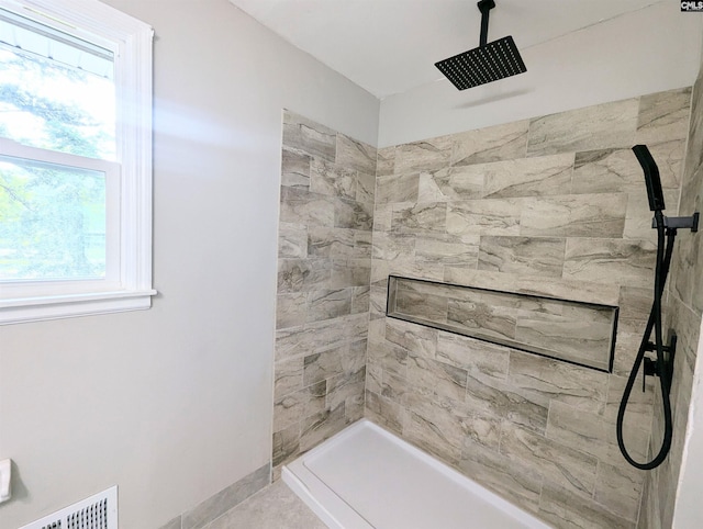 1921 Spotswood Dr, Columbia, SC 29210 - full bath with tiled shower, healthy amount of natural light, and baseboards