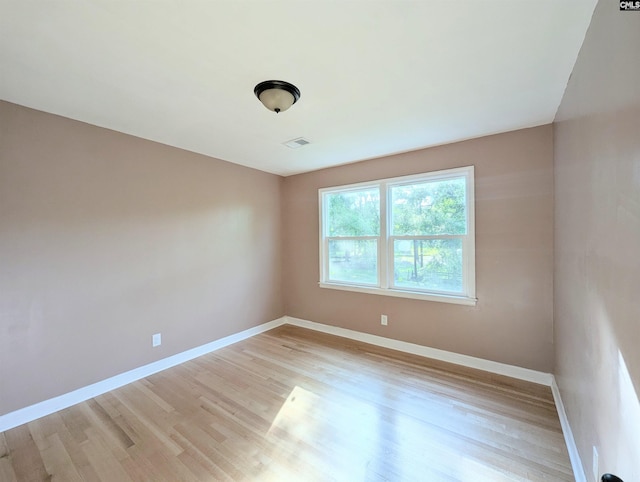 1921 Spotswood Dr, Columbia, SC 29210 - unfurnished room with baseboards and light wood-type flooring