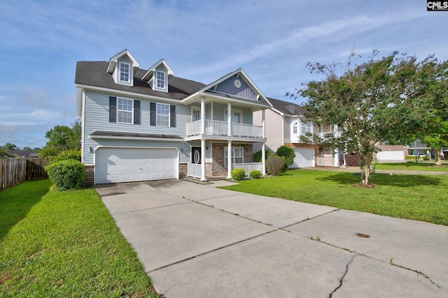 175 Nestle Ct, Columbia, SC 29209 - view of front of property featuring stone siding, a balcony, driveway, a porch, and an attached garage