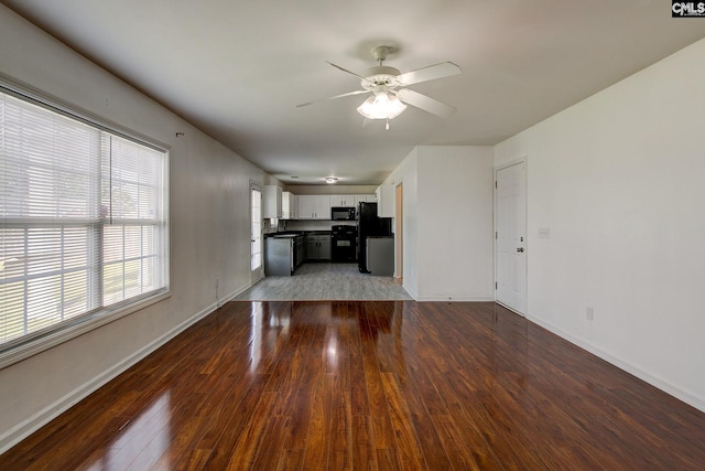 175 Nestle Ct, Columbia, SC 29209 - unfurnished living room with dark wood-style floors, ceiling fan, and baseboards