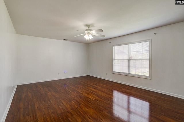 175 Nestle Ct, Columbia, SC 29209 - spare room featuring dark wood finished floors, ceiling fan, and baseboards