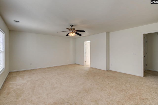 175 Nestle Ct, Columbia, SC 29209 - spare room featuring light carpet, ceiling fan, and plenty of natural light