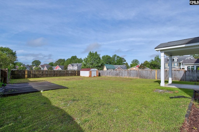 175 Nestle Ct, Columbia, SC 29209 - view of yard with a storage unit, an outbuilding, and a patio