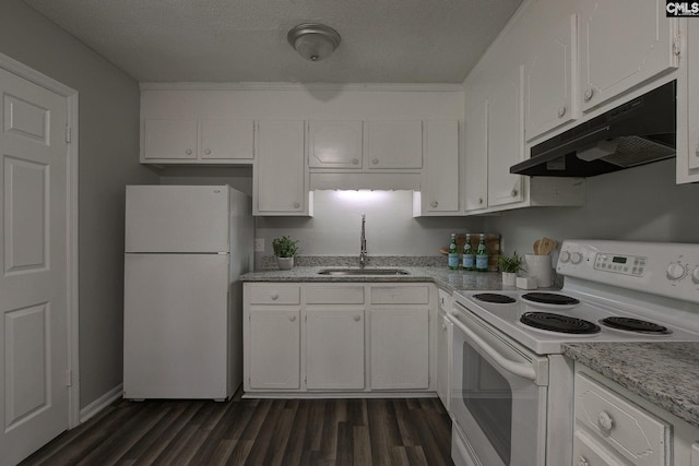 kitchen featuring white appliances, under cabinet range hood, a sink, white cabinets, and dark wood finished floors