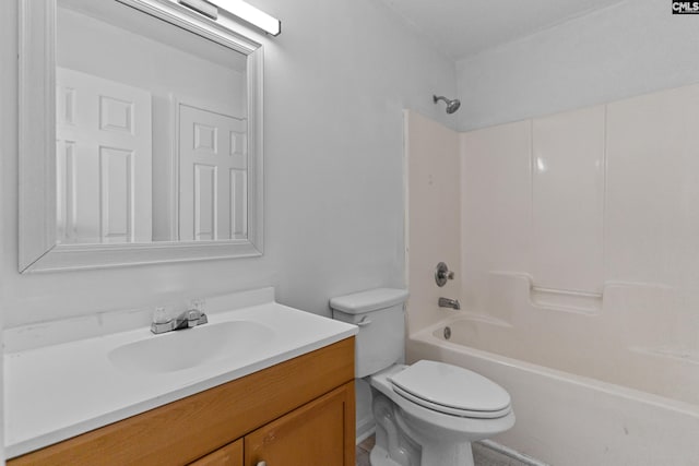 full bathroom with vanity, toilet, and  shower combination