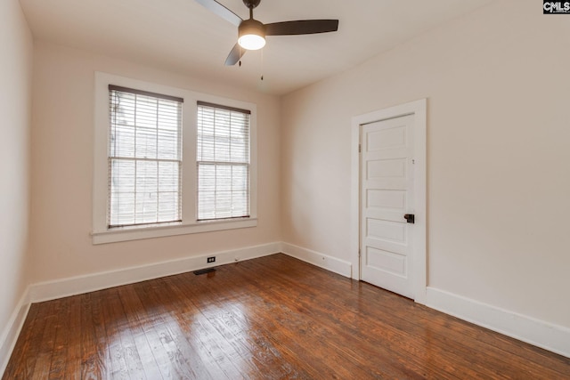 808 Oak St, Columbia, SC 29205 - spare room with ceiling fan, dark wood-type flooring, and baseboards