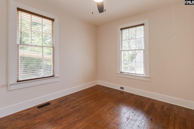 808 Oak St, Columbia, SC 29205 - empty room with plenty of natural light, baseboards, dark wood-type flooring, and a ceiling fan