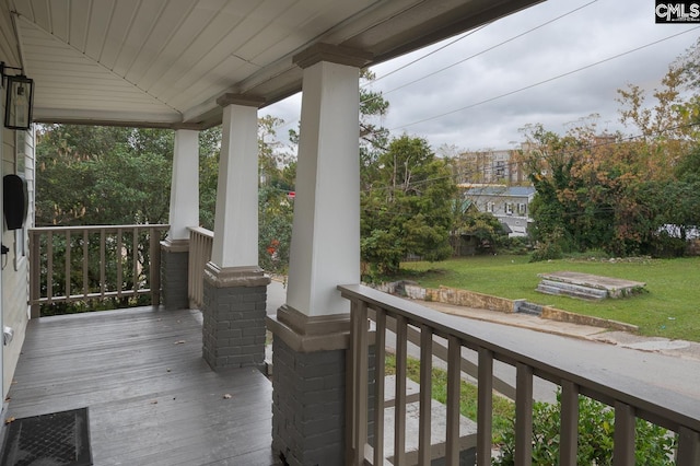 808 Oak St, Columbia, SC 29205 - wooden terrace featuring covered porch and a lawn