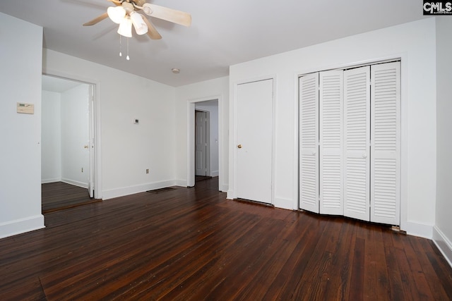 808 Oak St, Columbia, SC 29205 - unfurnished bedroom with dark wood-style flooring, baseboards, and a ceiling fan