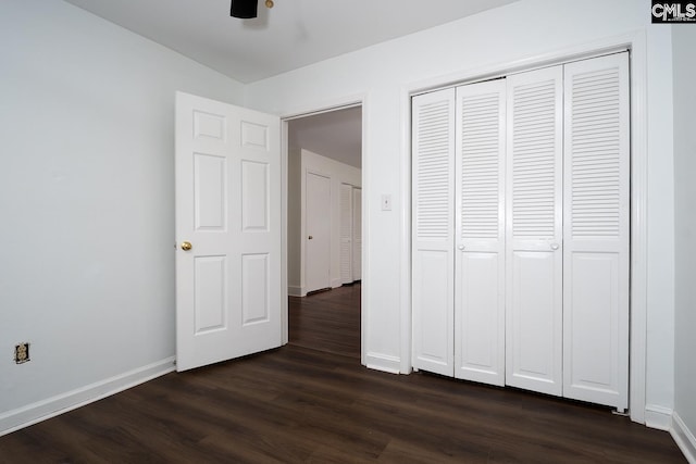 808 Oak St, Columbia, SC 29205 - unfurnished bedroom with dark wood-style floors, baseboards, and a closet