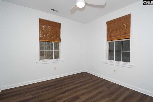808 Oak St, Columbia, SC 29205 - unfurnished room with dark wood finished floors, baseboards, and a ceiling fan