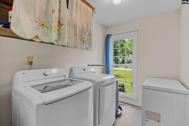 401 Brickling Rd, Irmo, SC 29063 - clothes washing area featuring washing machine and dryer and light tile patterned flooring