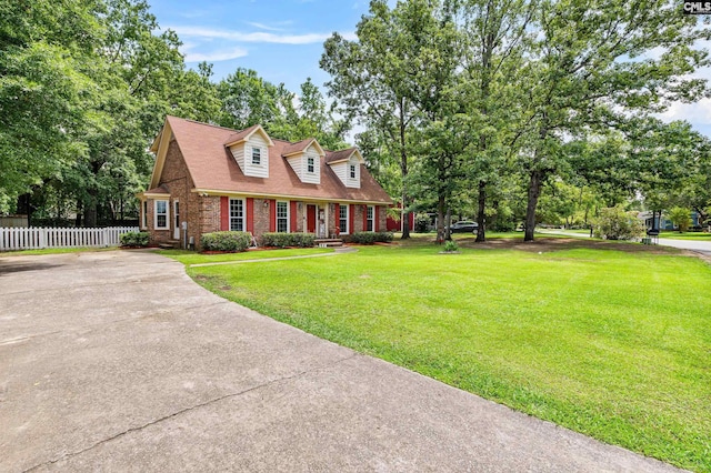 401 Brickling Rd, Irmo, SC 29063 - cape cod-style house with brick siding and concrete driveway