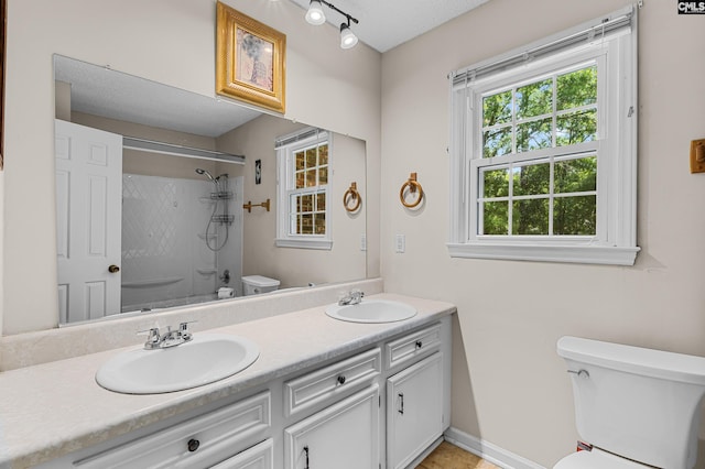 401 Brickling Rd, Irmo, SC 29063 - bathroom featuring toilet, a shower, and double vanity