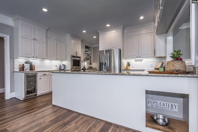 3 Puddle Ln, Camden, SC 29020 - kitchen featuring stainless steel appliances, wine cooler, stone countertops, tasteful backsplash, and recessed lighting