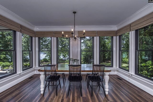 3 Puddle Ln, Camden, SC 29020 - sunroom / solarium featuring wood finished floors, ornamental molding, a chandelier, and baseboards