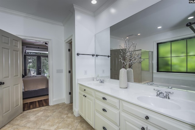 3 Puddle Ln, Camden, SC 29020 - bathroom featuring crown molding, tile patterned flooring, double vanity, connected bathroom, and recessed lighting