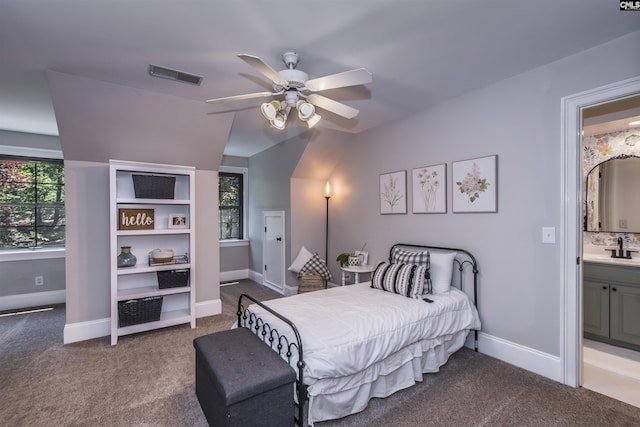 3 Puddle Ln, Camden, SC 29020 - bedroom with carpet flooring, a sink, baseboards, and vaulted ceiling