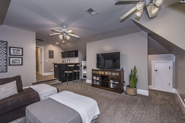 3 Puddle Ln, Camden, SC 29020 - carpeted living area with ceiling fan, bar area, baseboards, and lofted ceiling