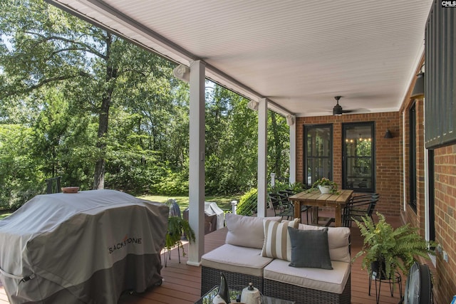 3 Puddle Ln, Camden, SC 29020 - sunroom with a ceiling fan, outdoor lounge area, outdoor dining area, and view of scattered trees