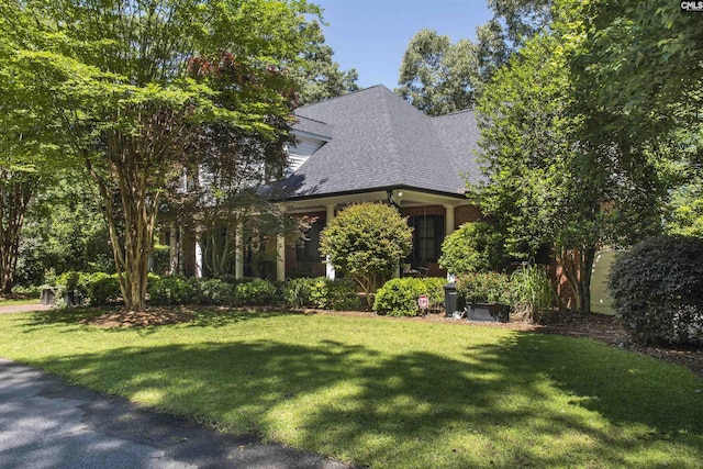 3 Puddle Ln, Camden, SC 29020 - view of front of home with a shingled roof and a front yard