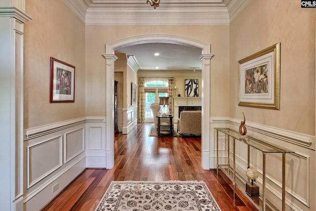 104 Preserve Ln, Columbia, SC 29209 - hallway with ornate columns, arched walkways, dark wood-style floors, ornamental molding, and a decorative wall