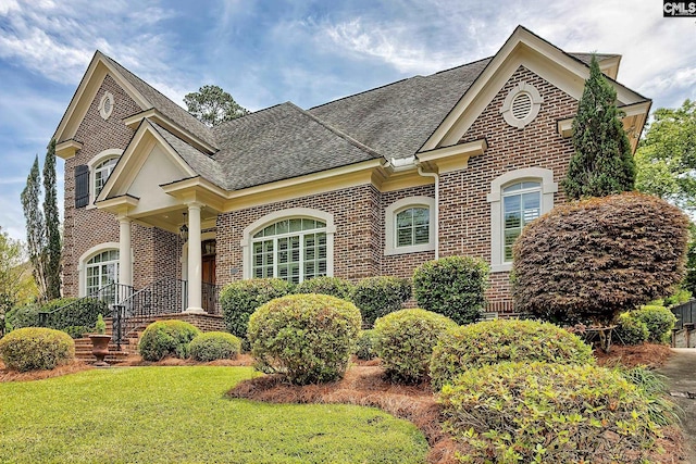 104 Preserve Ln, Columbia, SC 29209 - view of front of house with brick siding, roof with shingles, and a front lawn