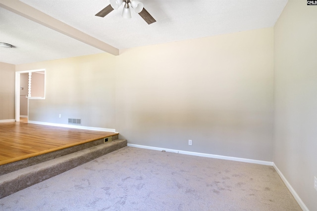 721 Seton Rd, Columbia, SC 29212 - carpeted spare room featuring ceiling fan, baseboards, and beamed ceiling