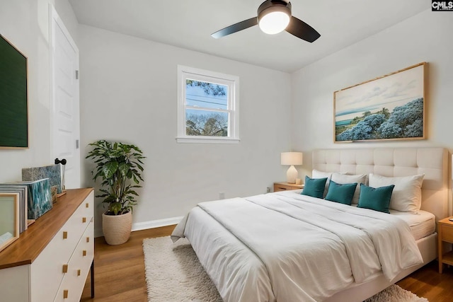 4520 Bluff Rd, Columbia, SC 29209 - bedroom with wood finished floors, baseboards, and ceiling fan