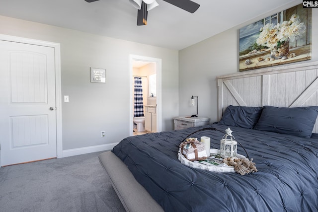 carpeted bedroom featuring baseboards, ceiling fan, and connected bathroom