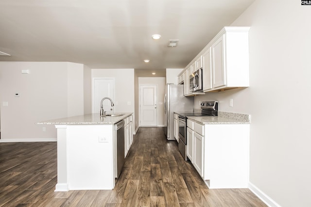341 Nehemiah Rd, Lexington, SC 29072 - kitchen with stainless steel appliances, a sink, dark wood-type flooring, an island with sink, and white cabinets