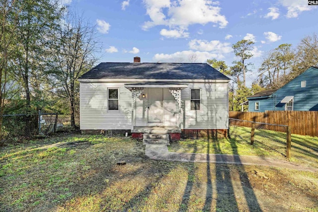 4717 Linden St, Columbia, SC 29203 - back of house featuring fence and a chimney