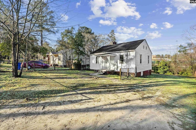 4717 Linden St, Columbia, SC 29203 - view of front of home featuring a chimney and a front lawn