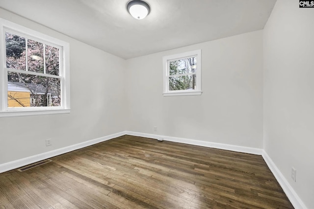 322 Glenn Ave, Columbia, SC 29203 - unfurnished room featuring dark wood-type flooring and baseboards