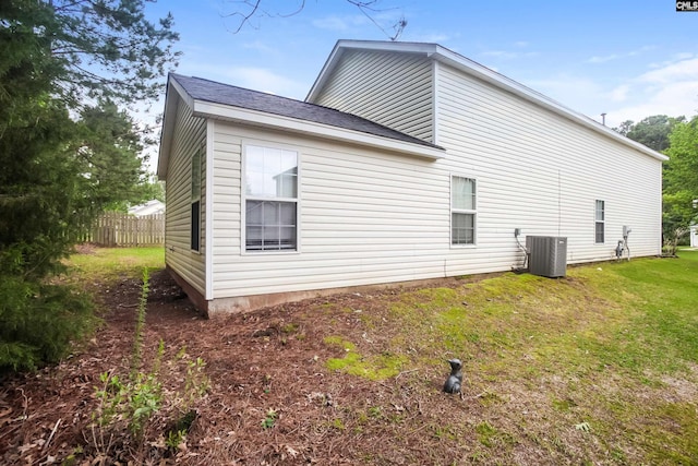 view of side of property featuring cooling unit