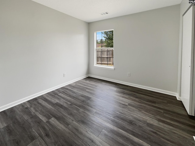8 Brushwood Ct, Columbia, SC 29229 - unfurnished bedroom with dark wood-type flooring and baseboards