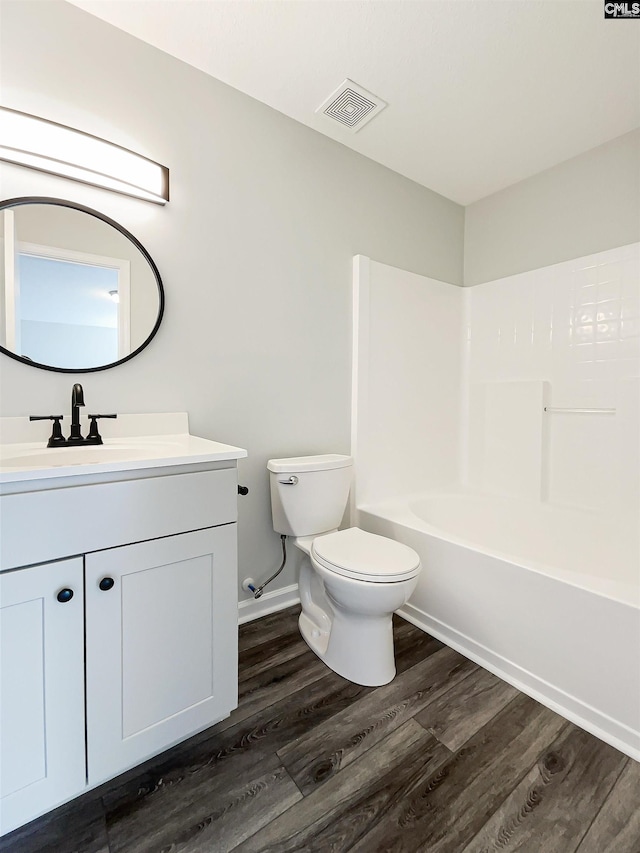8 Brushwood Ct, Columbia, SC 29229 - bathroom with toilet, wood finished floors, vanity, and shower / bathtub combination